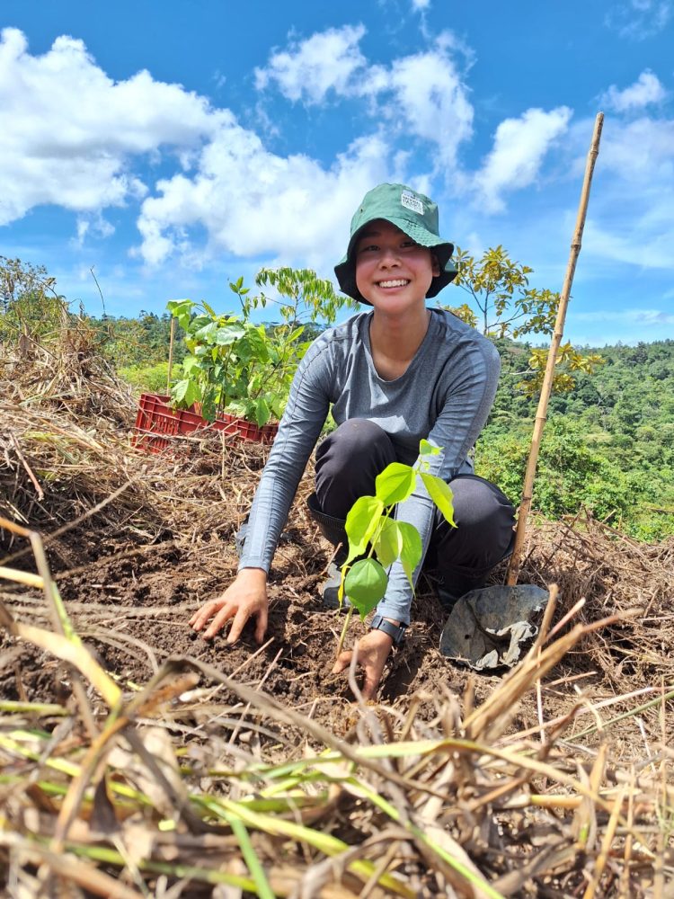 (winner) Happy student planting tree